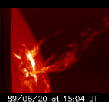 Solar flare beneath a prominence at the limb of the sun